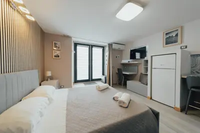 Letto o letti in una camera di Bosco Rooms - Via Napoli - Ground Floor