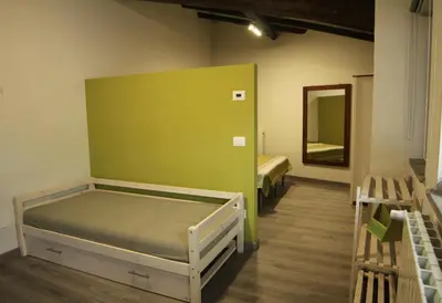 Letto o letti in una camera di Aetna Silva