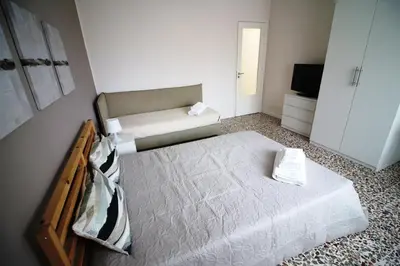 Letto o letti in una camera di Giuffrida Apartment Rooms