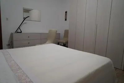 Letto o letti in una camera di La Magnolia