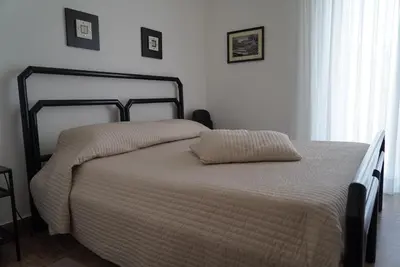 Letto o letti in una camera di La Magnolia