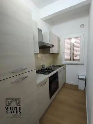 Cucina o angolo cottura di white caves catania home holiday