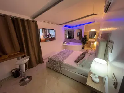 Letto o letti in una camera di Le Suite del Lungomare Catania