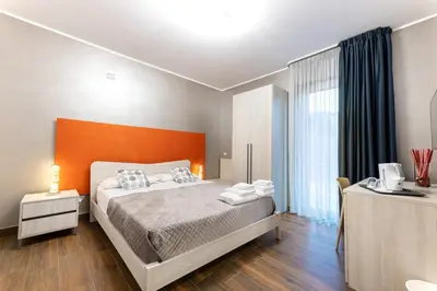 Letto o letti in una camera di Zaffiro Lavico rooms Etna nature sea