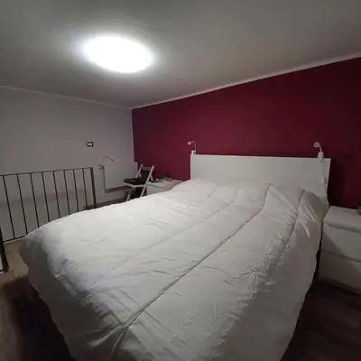 Letto o letti in una camera di Etna Home