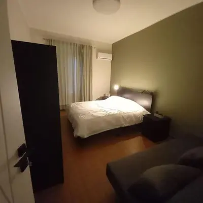 Letto o letti in una camera di Etna Home