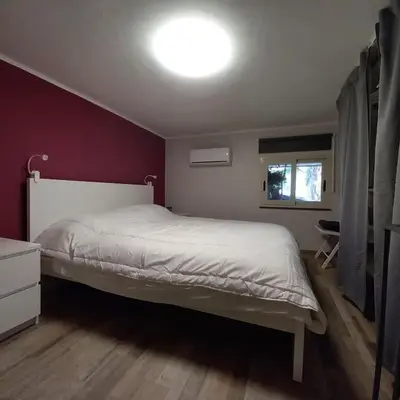 Letto o letti in una camera di Etna Home