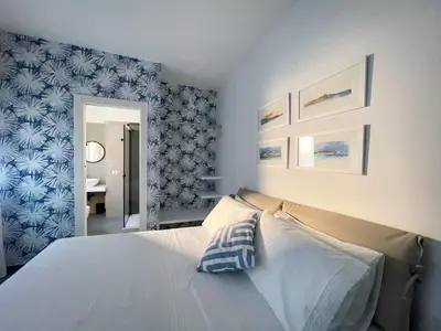 Letto o letti in una camera di Mareincasa