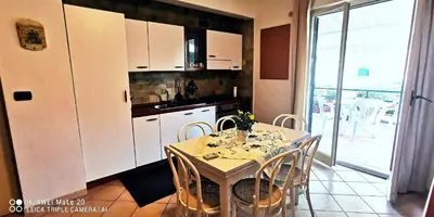 Cucina o angolo cottura di Sea Garden, fronte mare con piscina