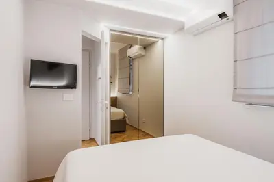 Letto o letti in una camera di Ferrini Home - Riso 80