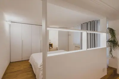 Letto o letti in una camera di Ferrini Home - Riso 80