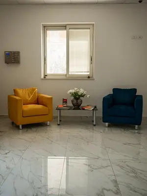 Area soggiorno di ROOMS alCentro