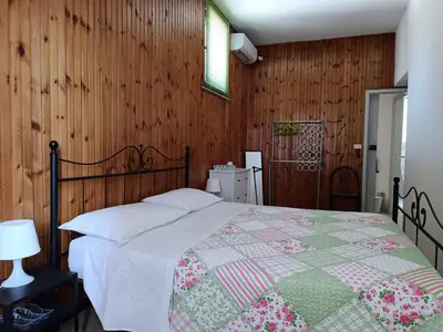 Letto o letti in una camera di La segreteria