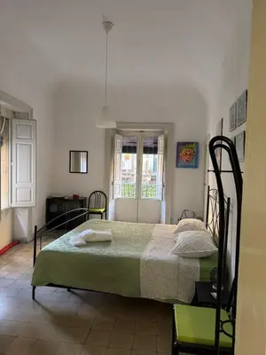 Letto o letti in una camera di La segreteria