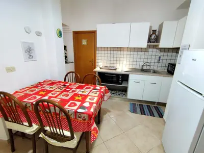 Cucina o angolo cottura di La Casa Di Via Marzulli