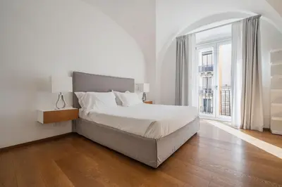 Letto o letti in una camera di RG8 Independent Apartment