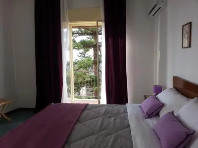 Letto o letti in una camera di Appartamento Raggio Di Sole