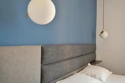 Letto o letti in una camera di Dadà Suites