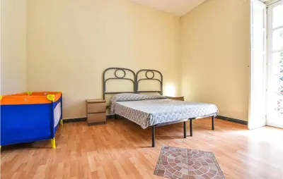 Letto o letti in una camera di 1 Bedroom Awesome Apartment In Acireale