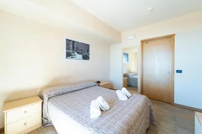 Letto o letti in una camera di Rifugio Sapienza