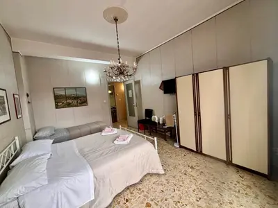 Letto o letti in una camera di Appartamento turistico Giarre Offre Camera in condivisione Euro 300 al mese