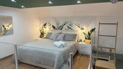 Letto o letti in una camera di Figli Di Agata