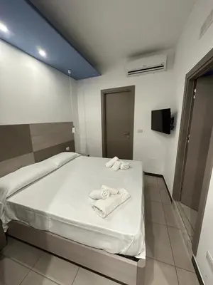 Letto o letti in una camera di Notti Magiche