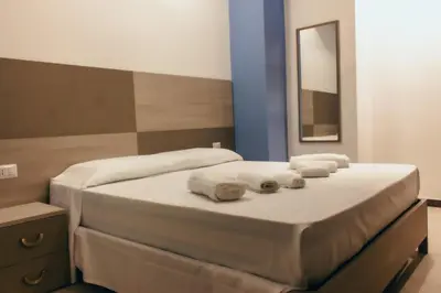 Letto o letti in una camera di Notti Magiche