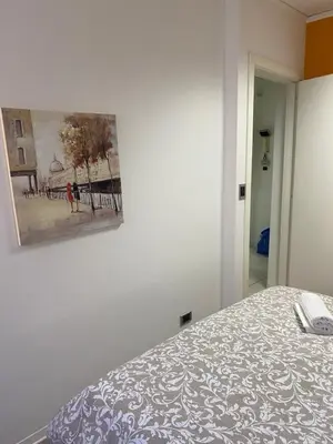 Letto o letti in una camera di PIRANDELLO HOME