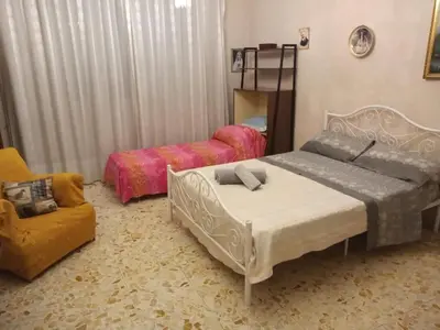 Letto o letti in una camera di LG Appartamento Turistico Giarre