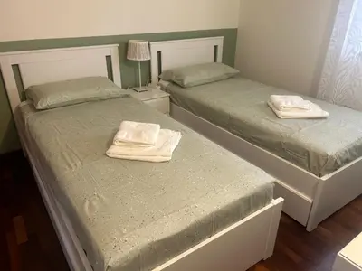 Letto o letti in una camera di Casa Terrazza del Sole