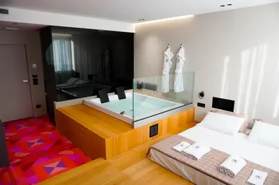 Letto o letti in una camera di ZOE LUXURY SUITES