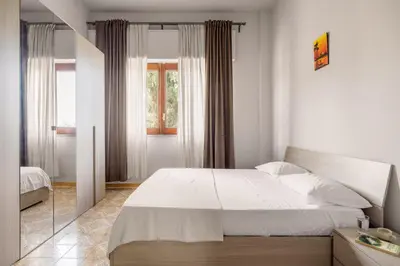 Letto o letti in una camera di PRAIOLA BEACH HOUSE