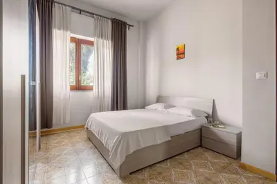Letto o letti in una camera di PRAIOLA BEACH HOUSE