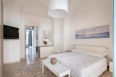 Letto o letti in una camera di GuestHost - Cilea Central Apt a few steps from the Station