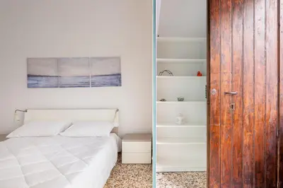 Letto o letti in una camera di GuestHost - Cilea Central Apt a few steps from the Station