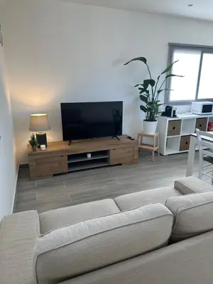 TV o dispositivi per l'intrattenimento presso Curia Apartment