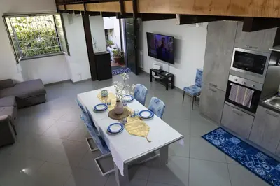 TV o dispositivi per l'intrattenimento presso Li Cuti House - Lungomare Self Check-in