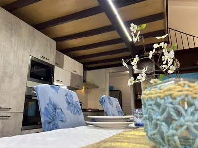 Cucina o angolo cottura di Li Cuti House - Lungomare Self Check-in