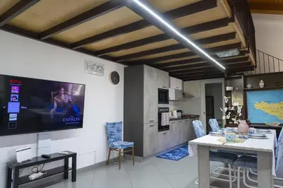 TV o dispositivi per l'intrattenimento presso Li Cuti House - Lungomare Self Check-in