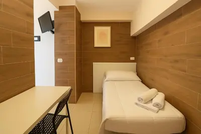 Letto o letti in una camera di Margherita Rooms
