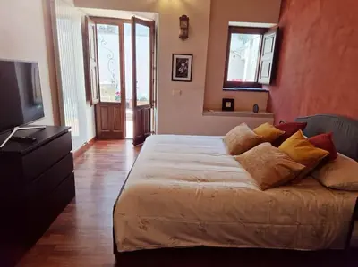 Letto o letti in una camera di Villa con fascino antico e comfort moderno