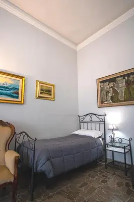 Letto o letti in una camera di Aci B&B