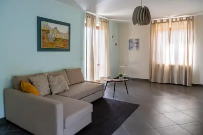 Area soggiorno di GuestHost - Villa Marazia with Garden and Parking!
