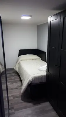 Letto o letti in una camera di Casa Fortuna