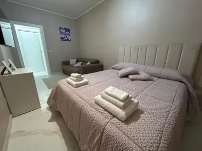 Letto o letti in una camera di Holiday house katanè