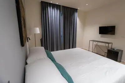 Letto o letti in una camera di Pasubio Quattro BB
