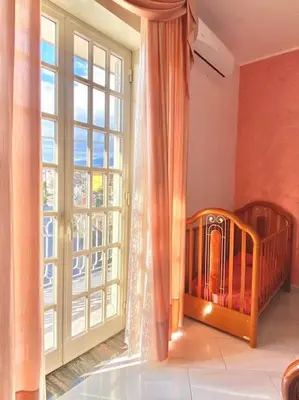 Letto o letti in una camera di CasaEtnaMarty Acireale