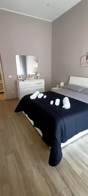 Letto o letti in una camera di Tindaro Home