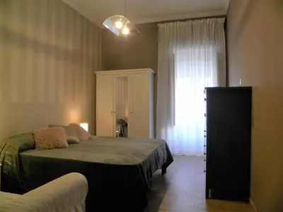 Letto o letti in una camera di CASA GORIZIA 63